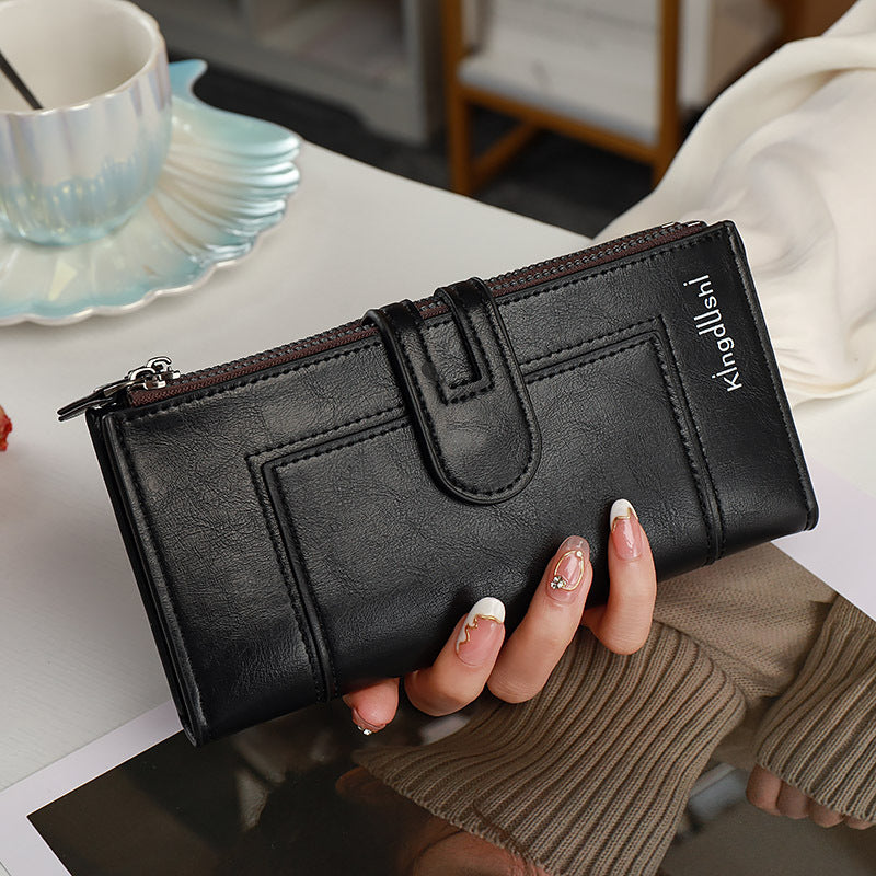 Portefeuille long pour femme à double fermeture éclair uni