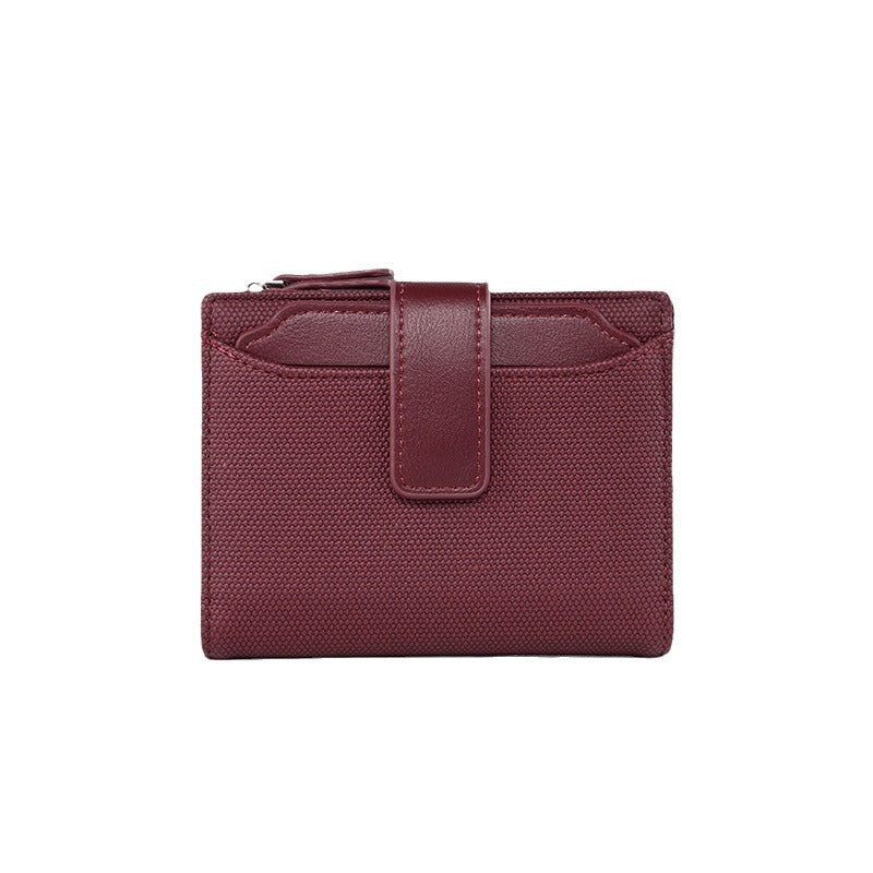 Portefeuille court en cuir de couleur unie pour femme